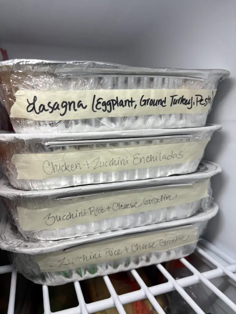 stack of aluminum pans in a freezer